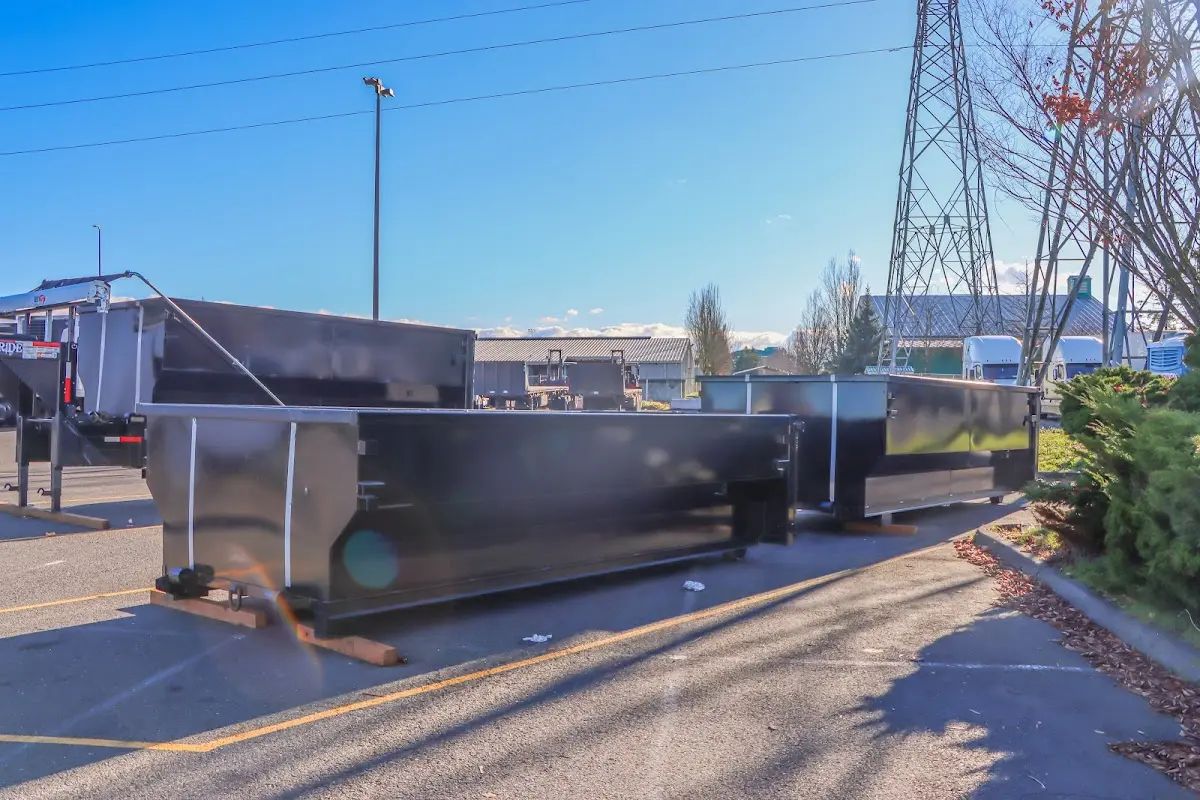 Roll-off dumpster ready for waste disposal at job site for Commercial Dumpster Rental in Orono